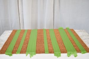 apply tape to doormat