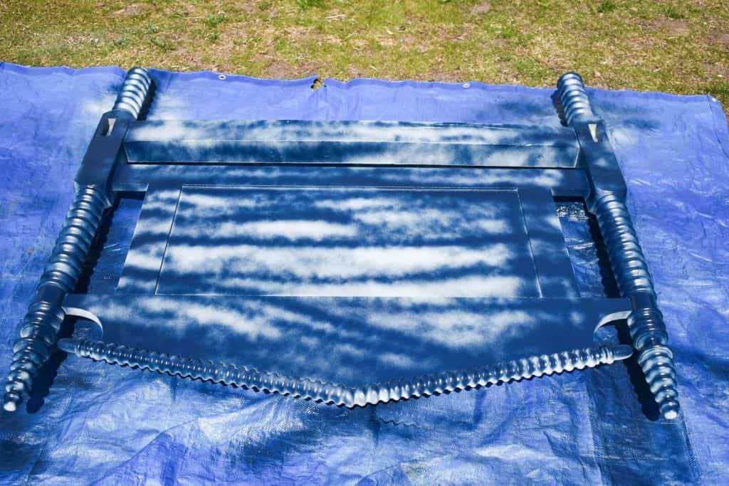 spray painting a headboard