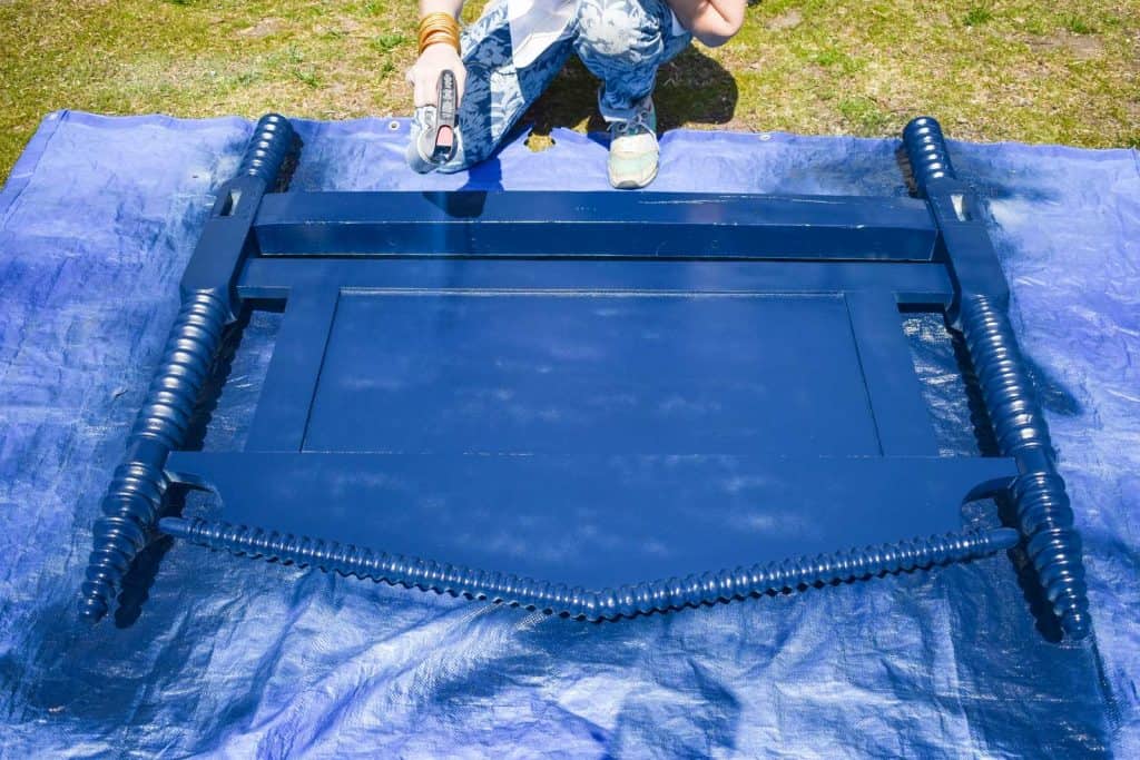 spray painting a headboard