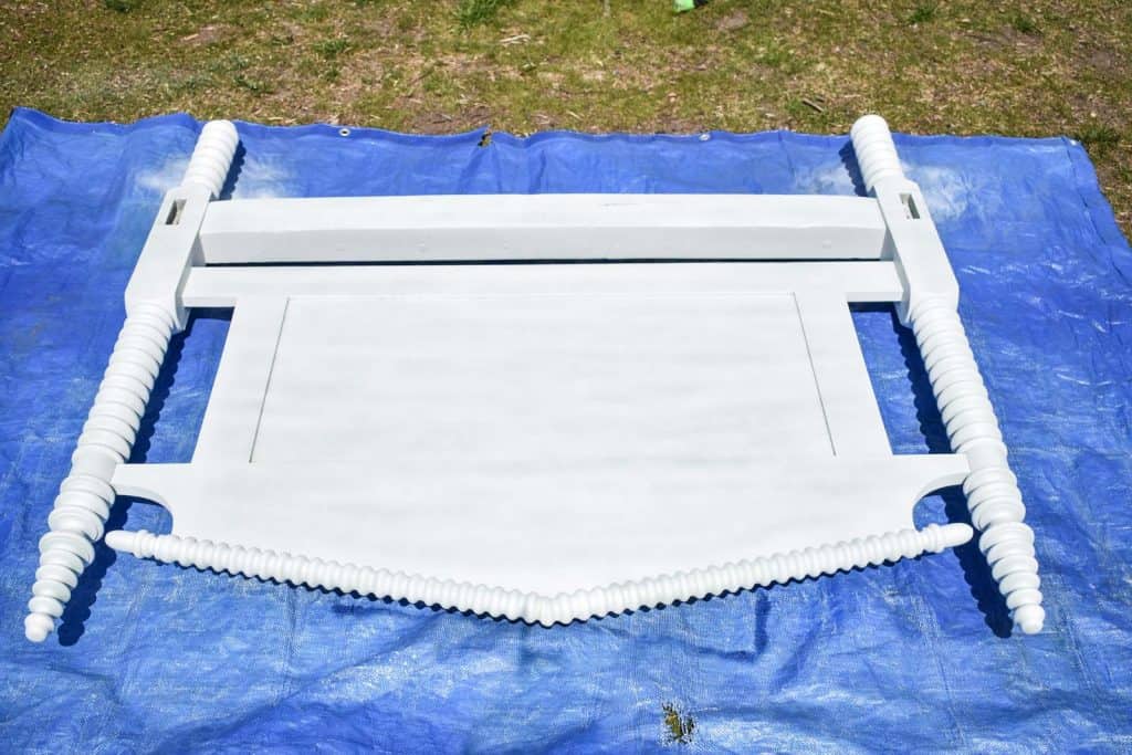 spray painting a headboard