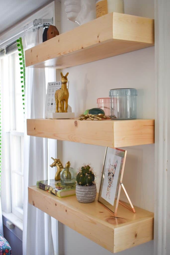 floating shelves in guest room
