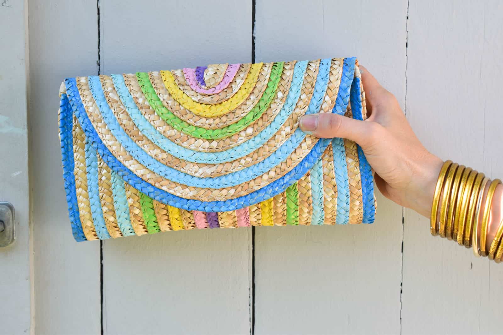 painted rainbow straw clutch