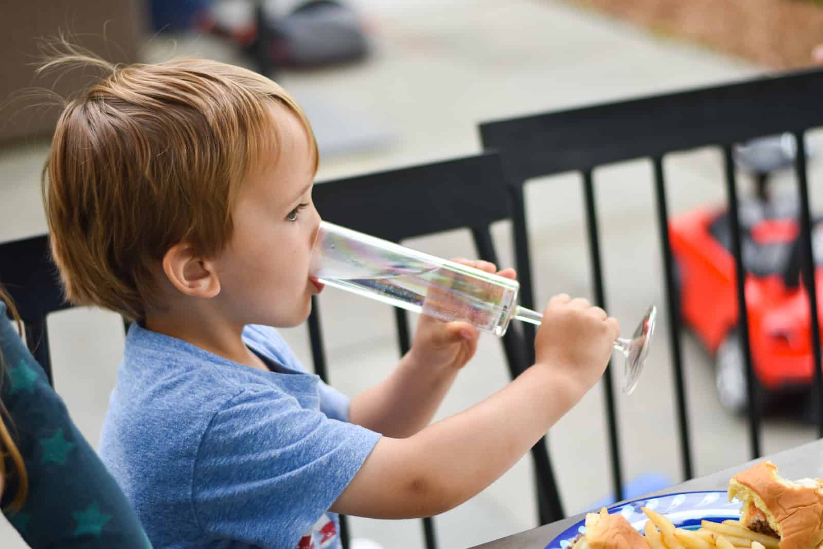 kids drinking out of champagne glass