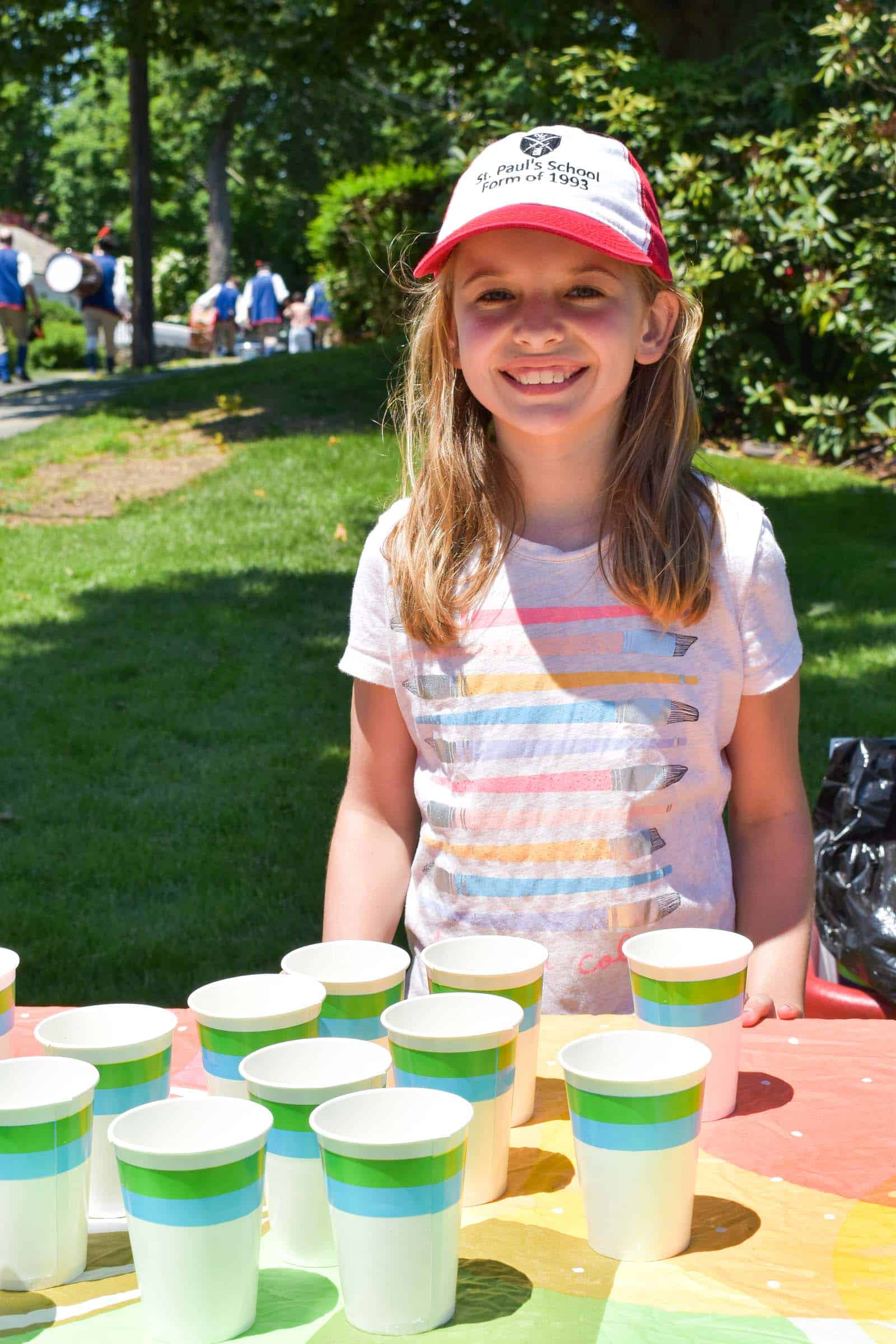 Setting up cups for lemonade sale