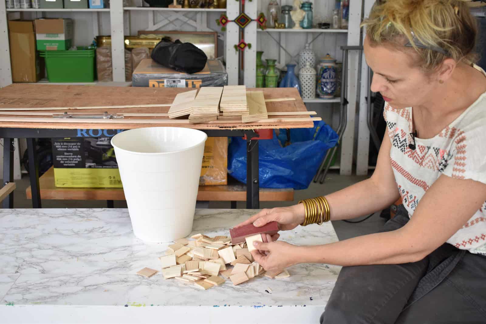 lightly sanding the squares of end cut 2x4s