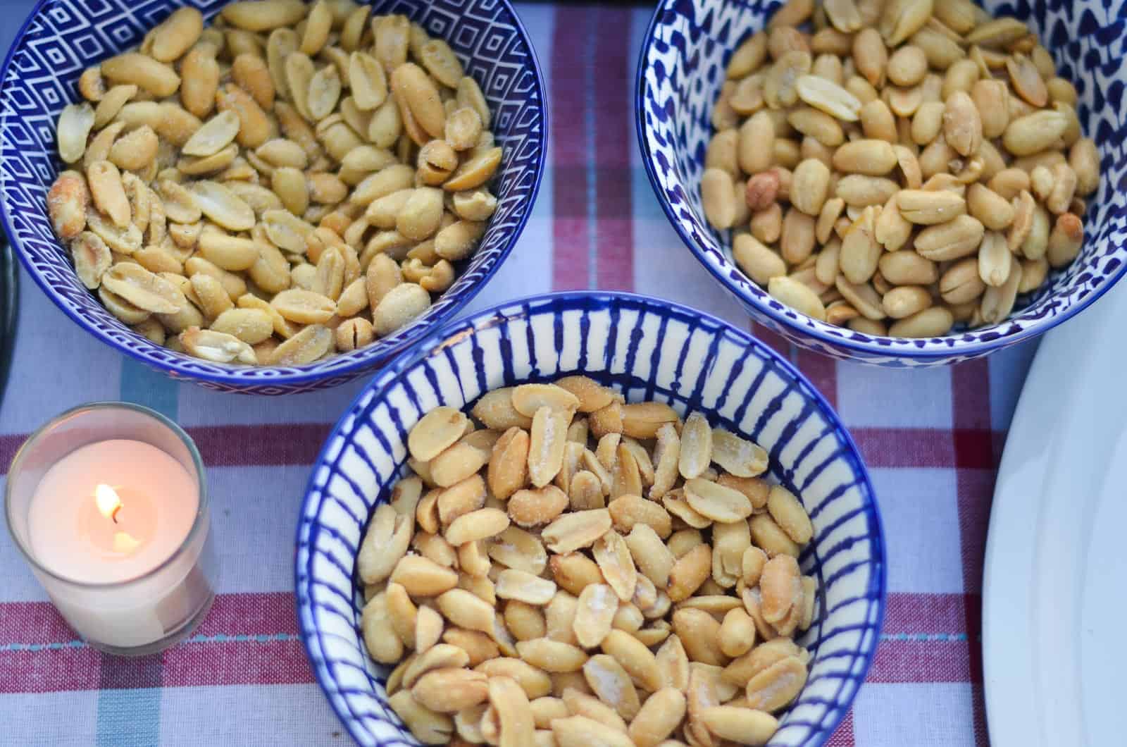 three blue and white ceramic bowls for peanuts