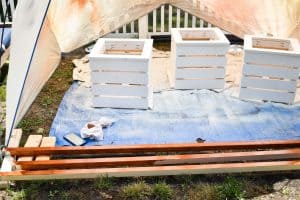 stained light post and painted planter boxes