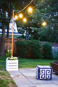 wooden planters with built in pole for patio string lights