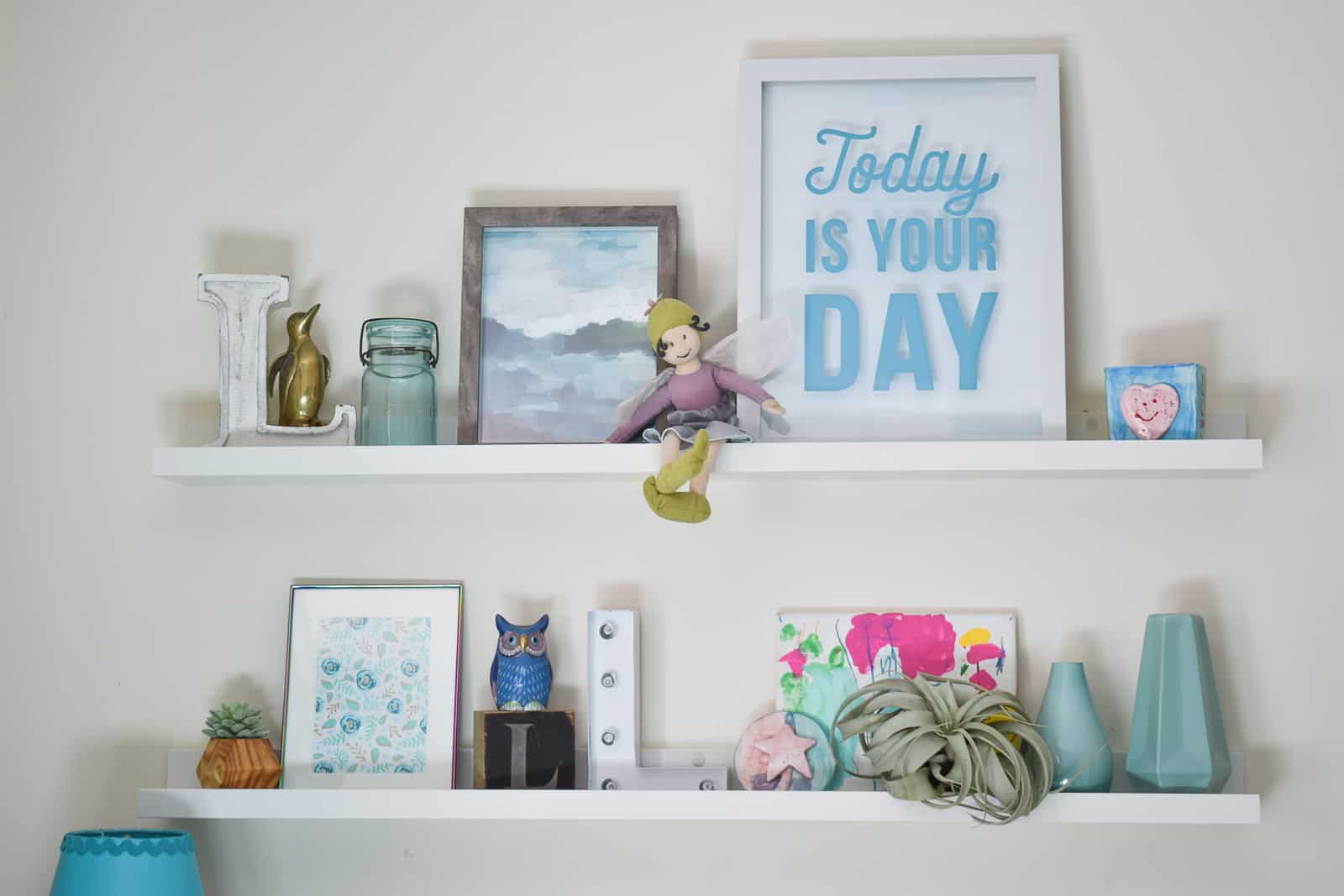 floating picture ledges over the dresser