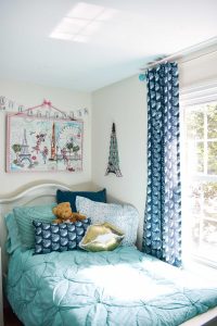 turquoise bed in little girls room