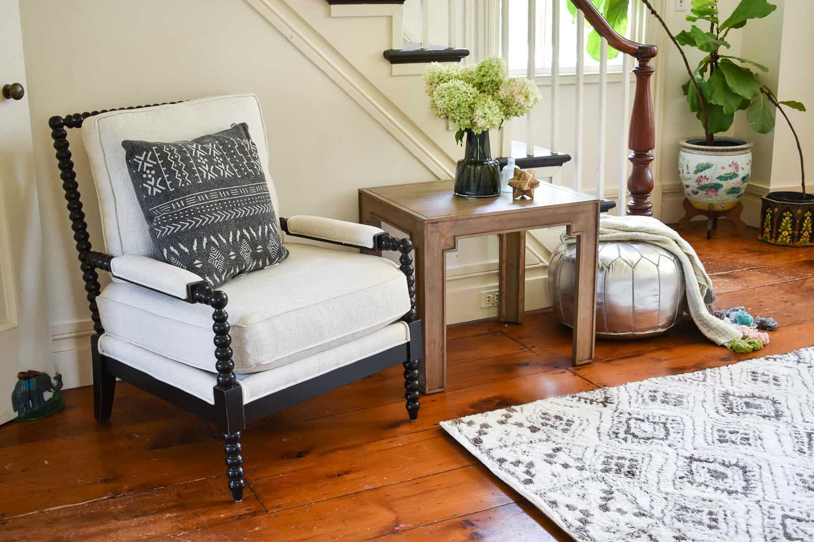 mudcloth pillow on spindle chair