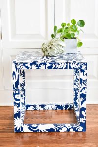 ottomi wallpaper table in family room