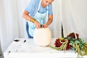 carve the top of the faux pumpkin