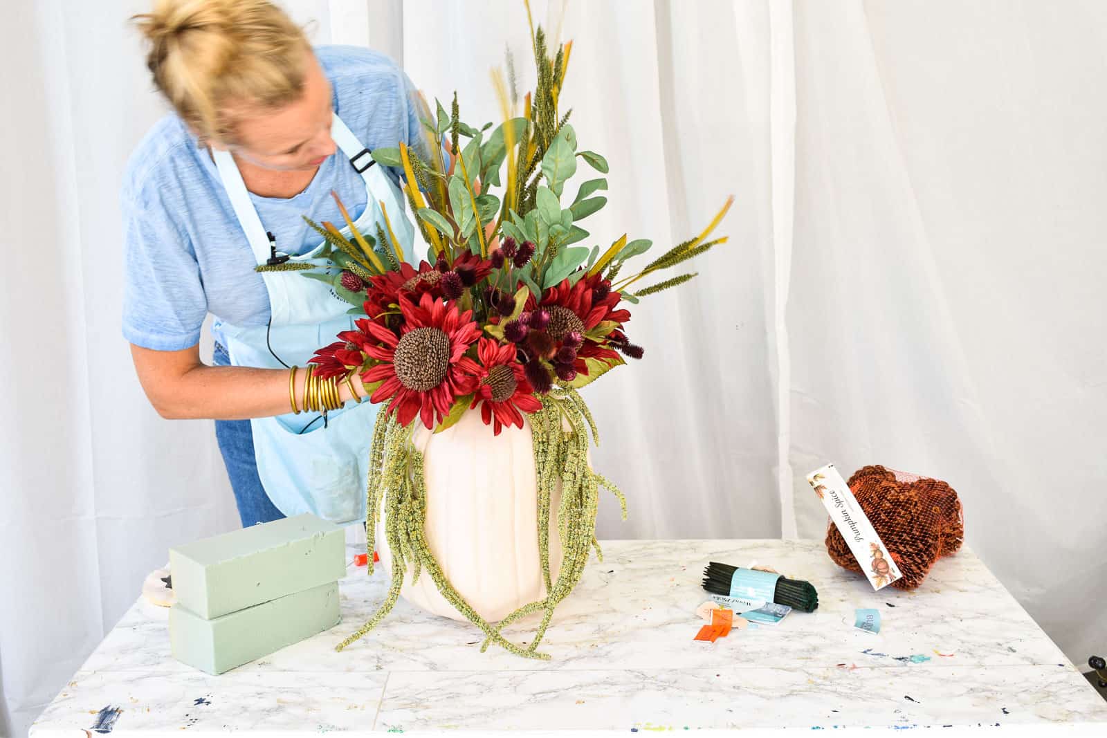 bend wire stems to balance floral arrangement