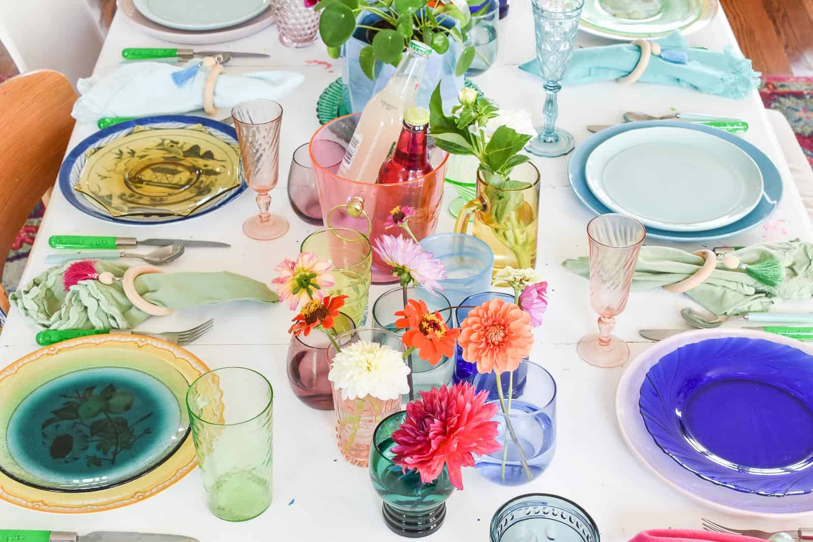 flowers in the middle of a colorful table
