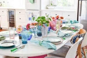 using rainbow glass to set a colorful table