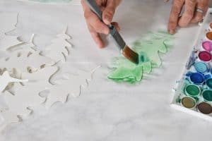 paint one color onto leaf with watercolor paint