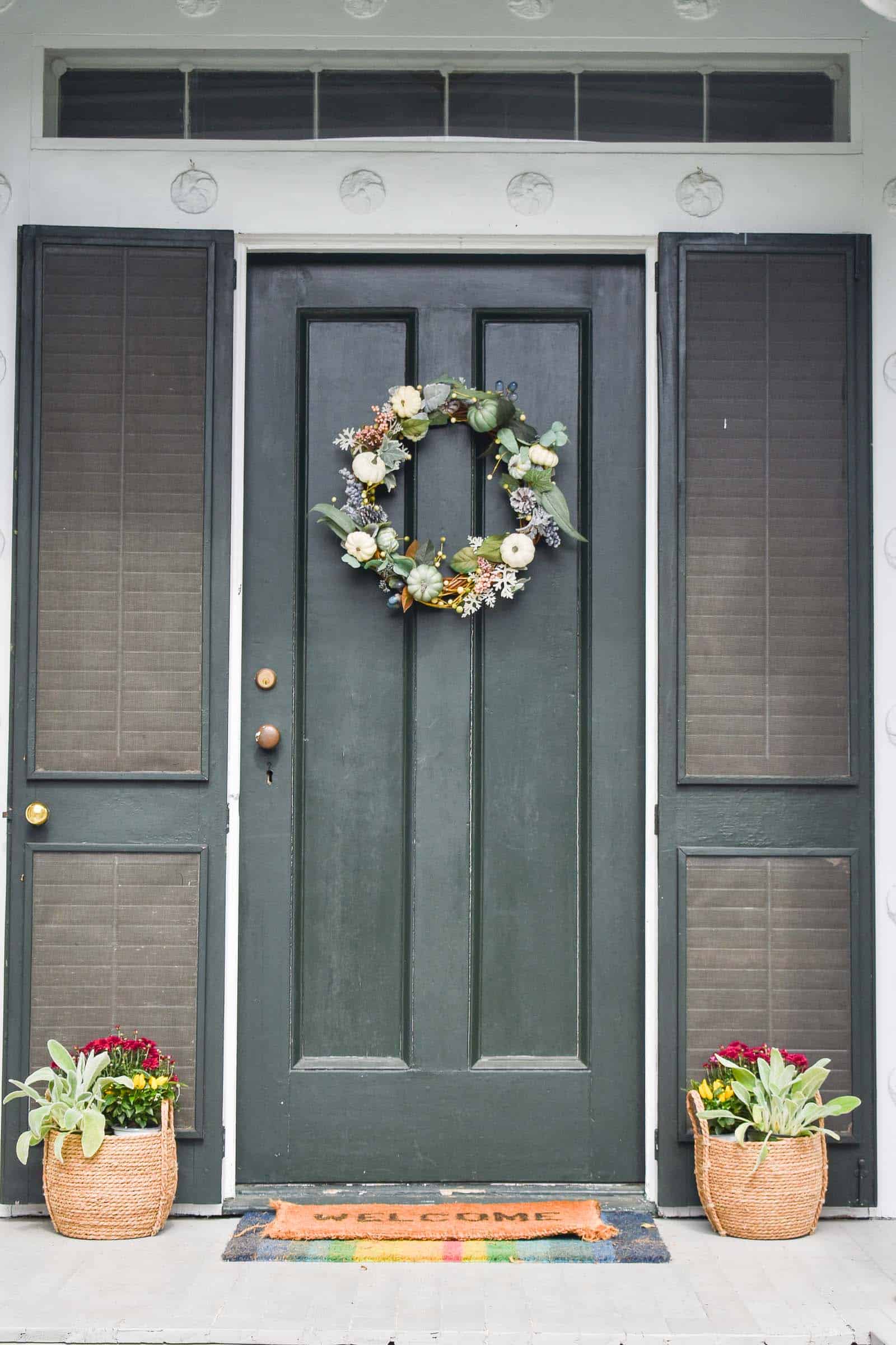 front porch with fall flowers