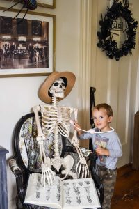 halloween skeleton posed as decoration