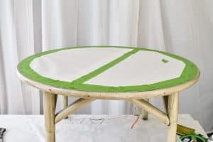 cover the table with white paper