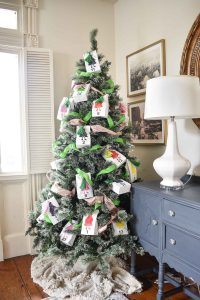 tuck advent bags into christmas tree