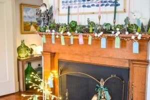 Fun christmas mantel with greenery and color