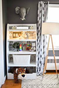 wallpaper in nursery bookshelf