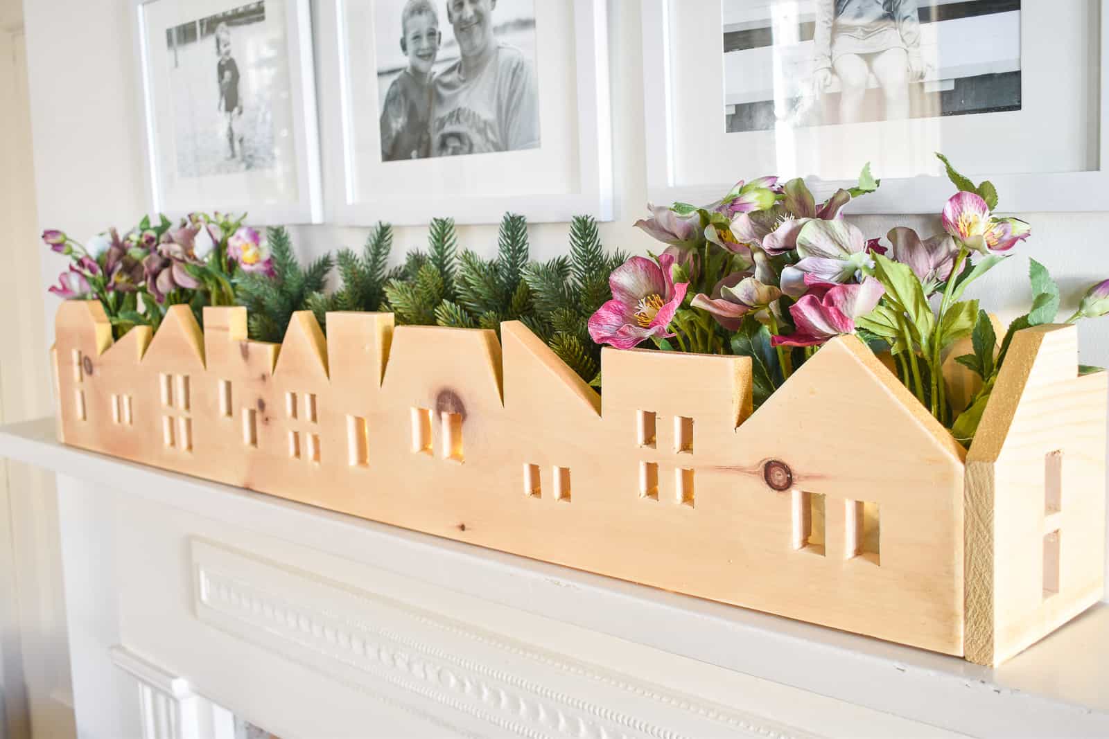 flowers in wooden skyline centerpiece