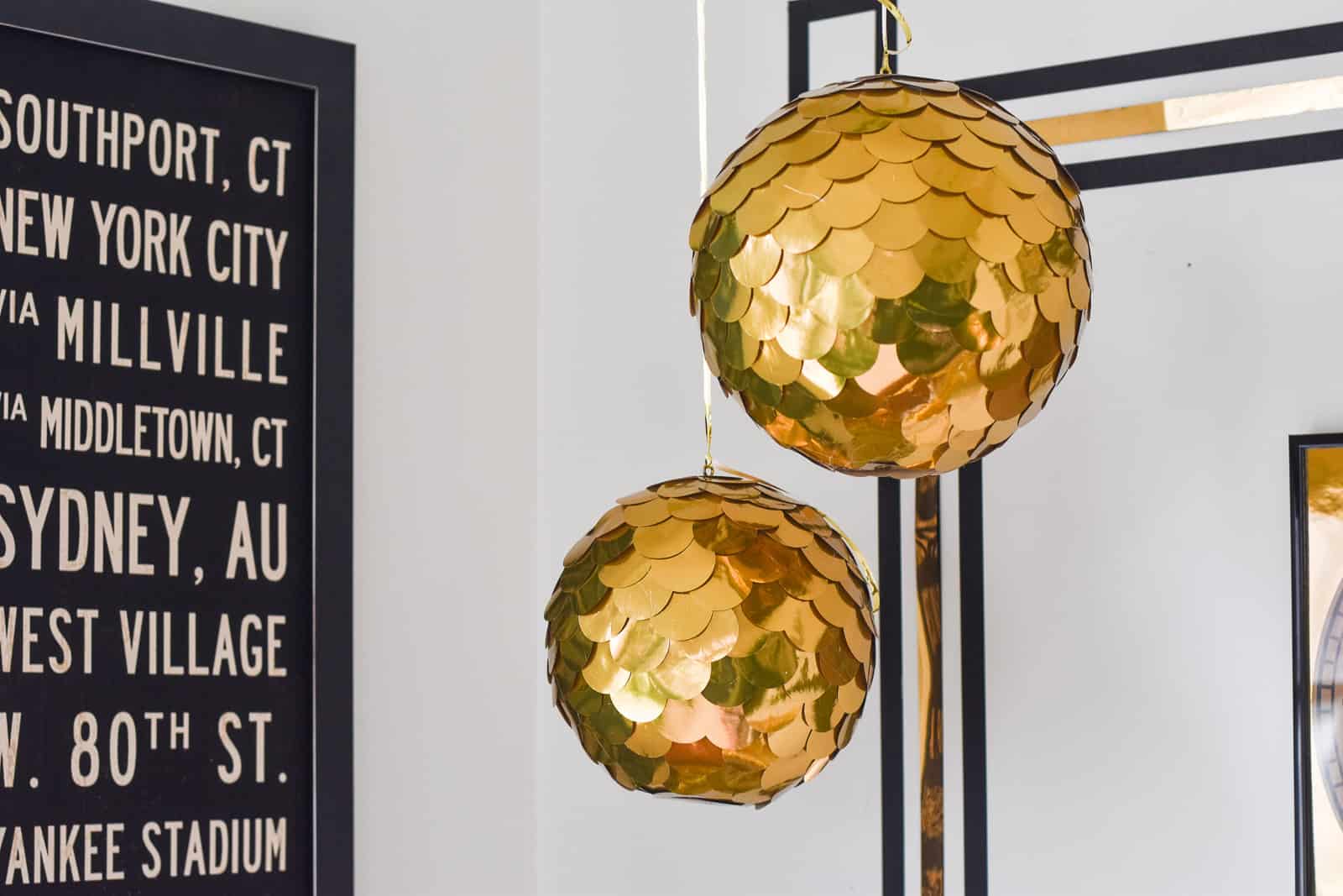 Silver and gold disco balls hang from the ceiling on New Years eve Holiday  Stock Photos