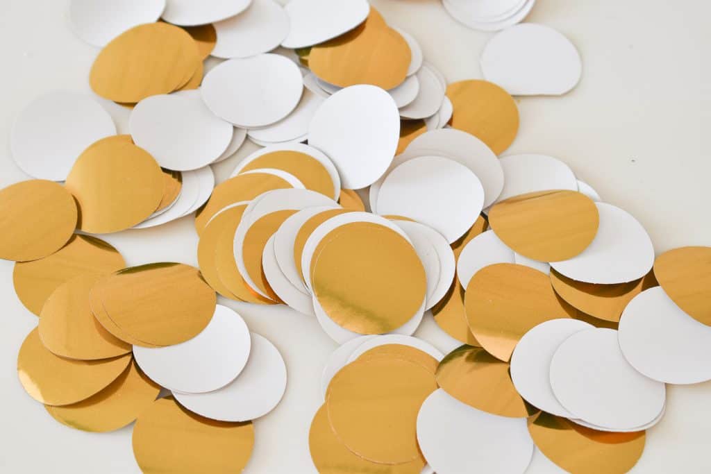 punch circles from gold paper