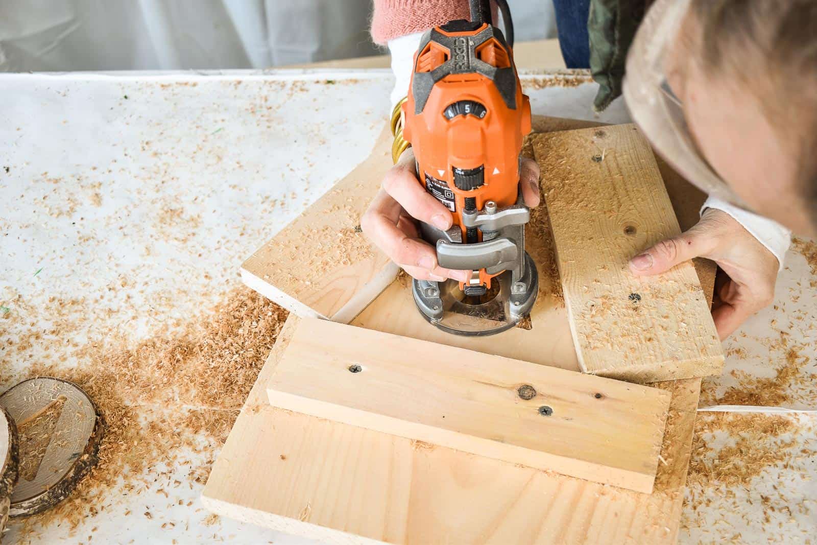 routing a christmas tree into wood slices