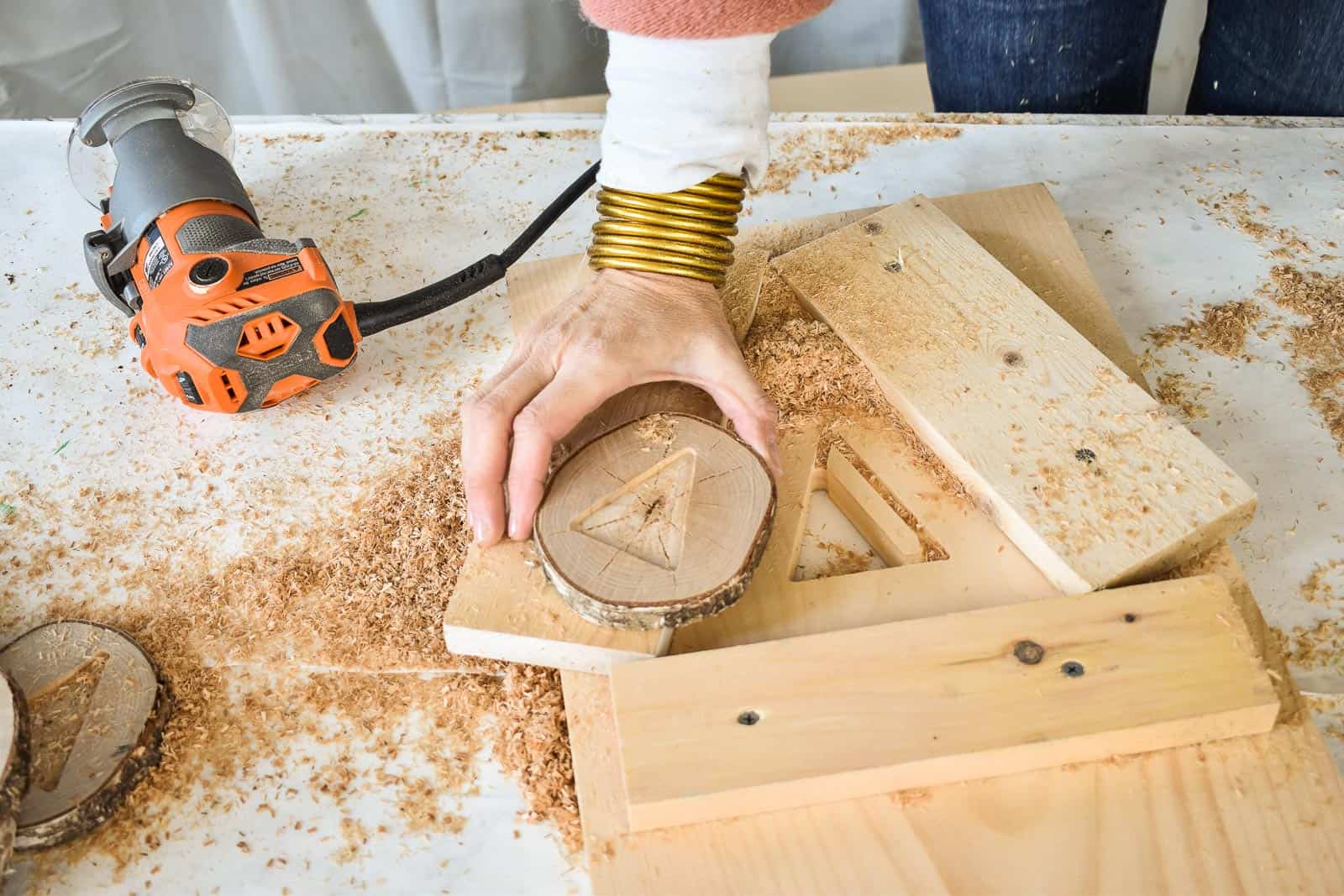 routing a christmas tree into wood slices