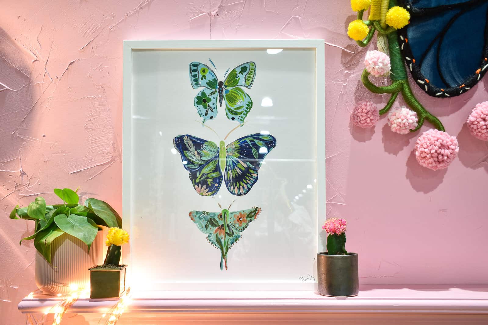 butterfly print in backyard space in philly home show