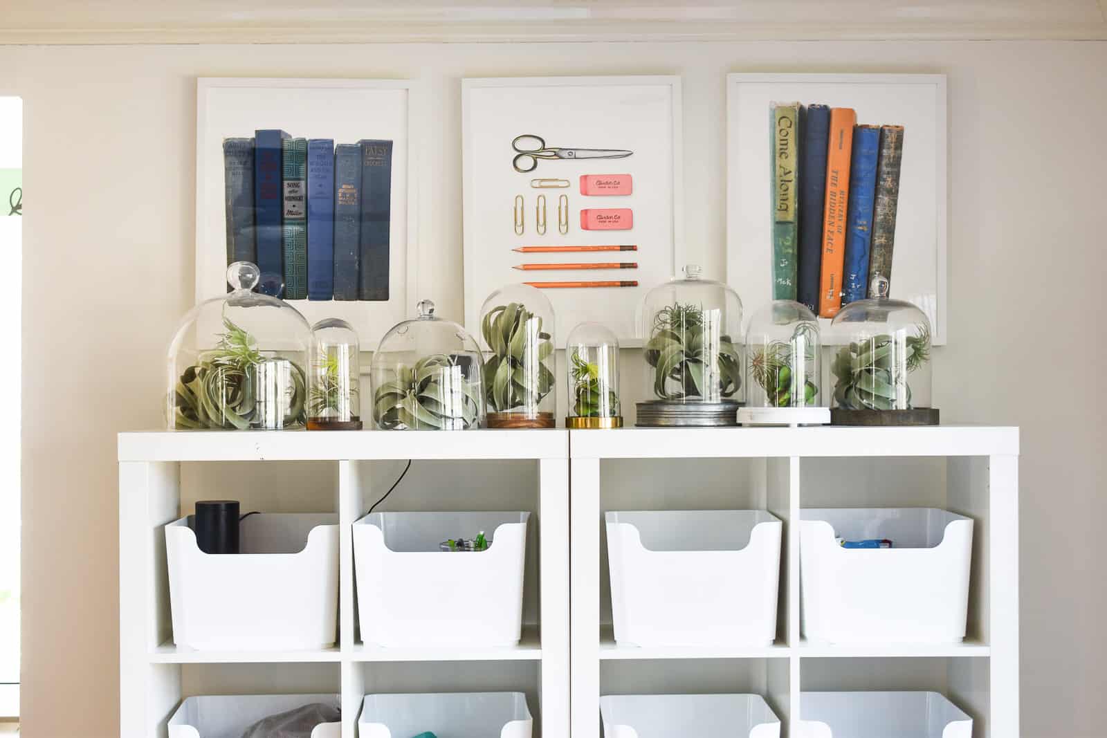 minted prints above the storage shelf