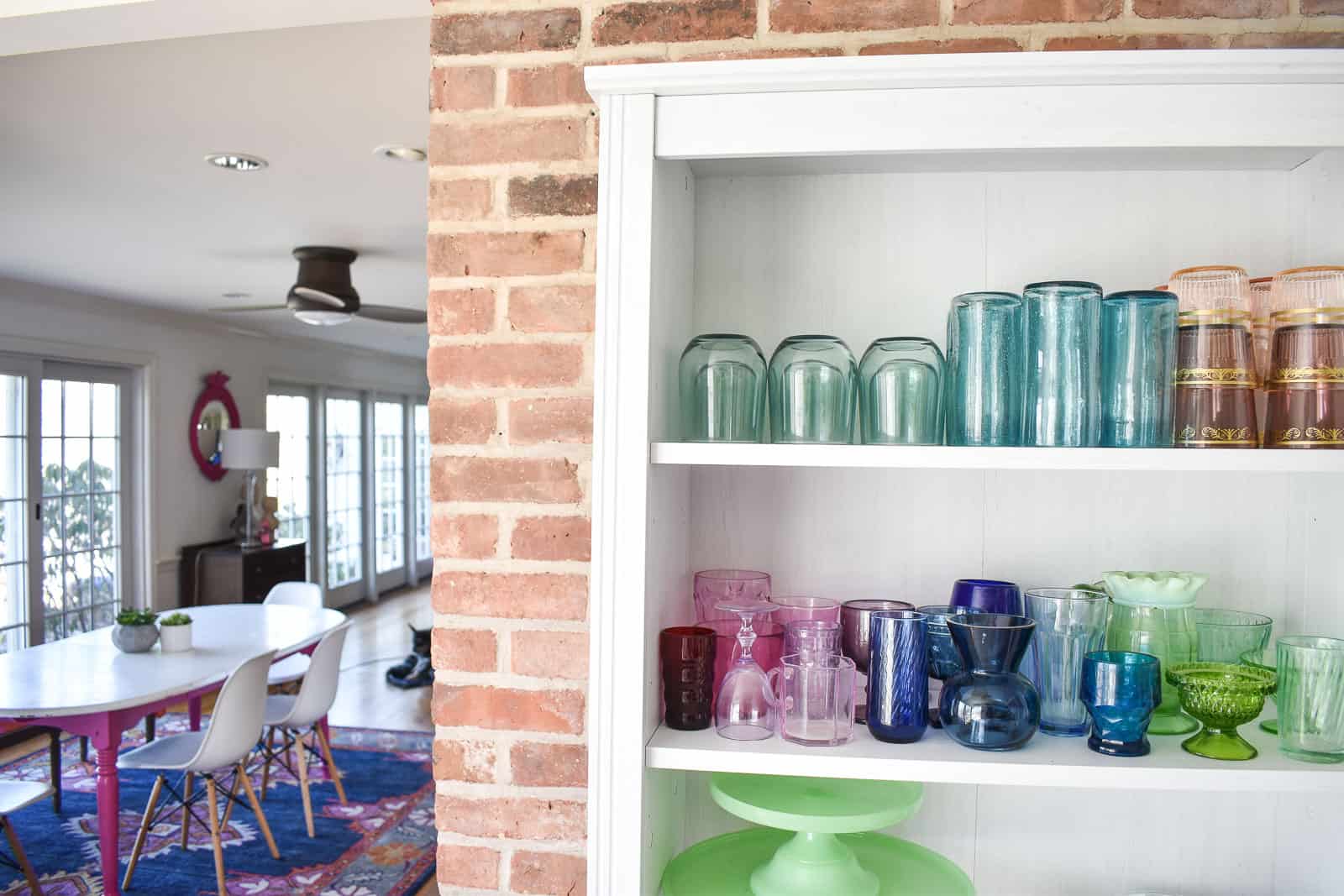 glassware on white shelf