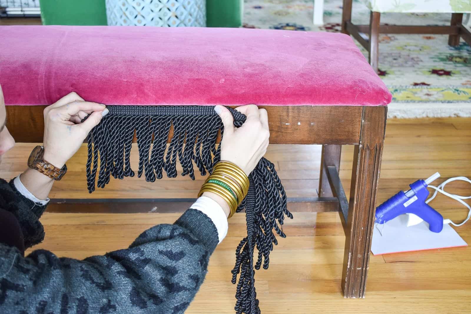 glue fringe onto upholstered bench