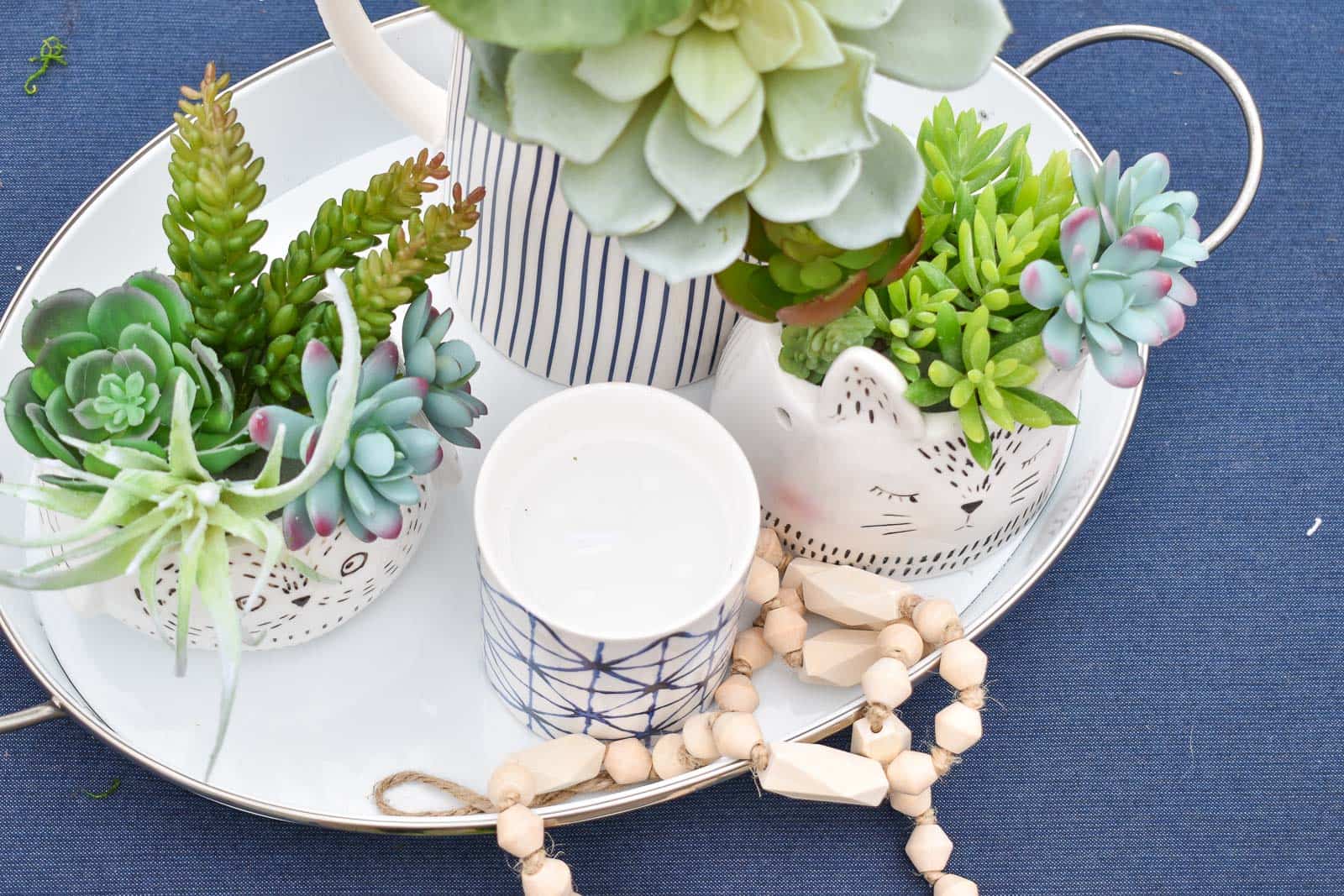 tray of faux succulent planters