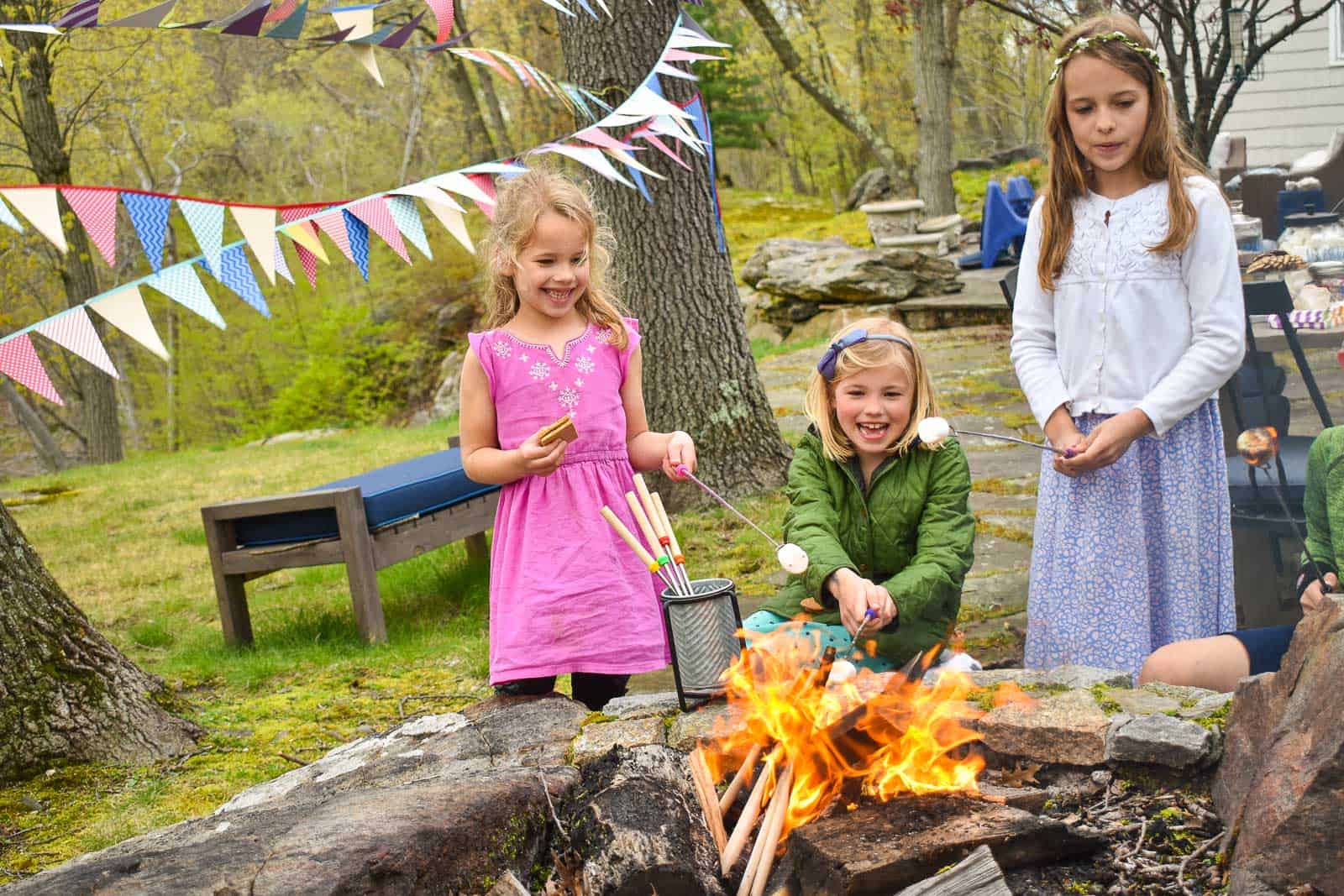 children making s'mores outside