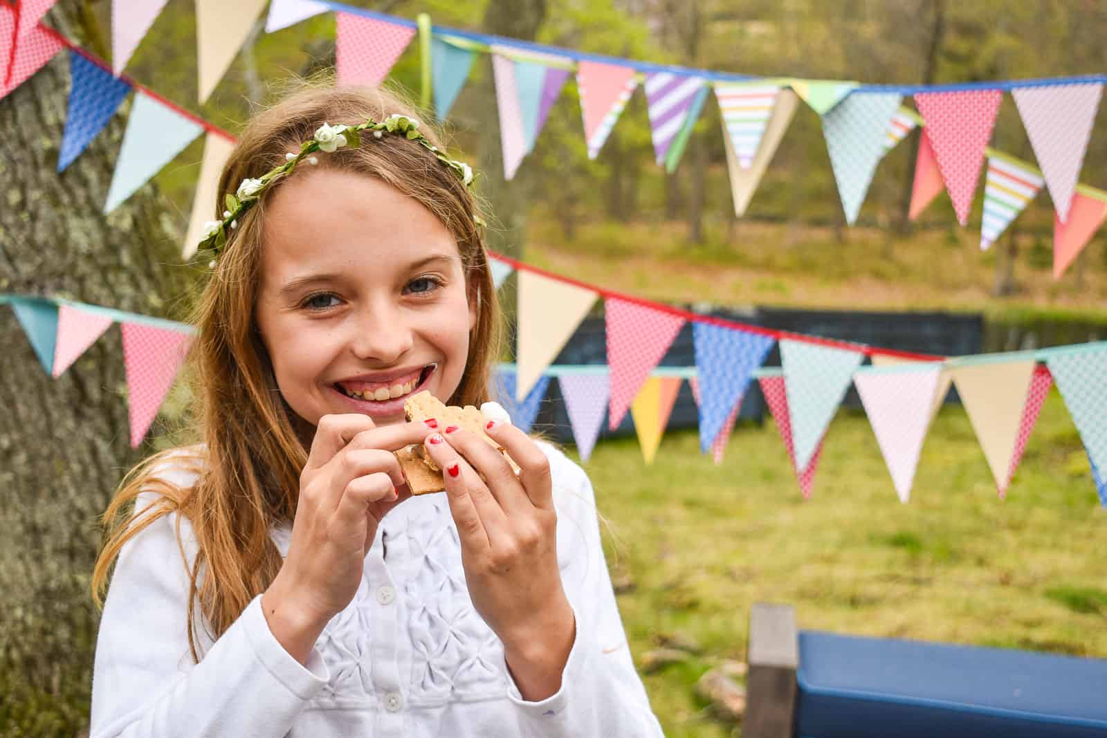 children making s'mores outside