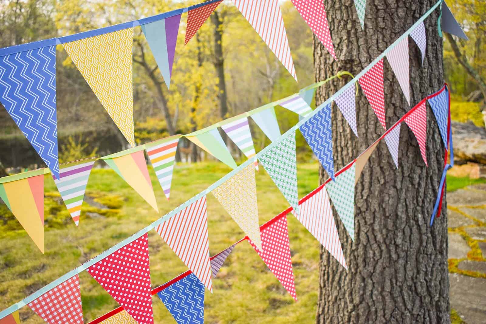 garland hanging between two trees