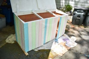 painting stripes on trash can shed