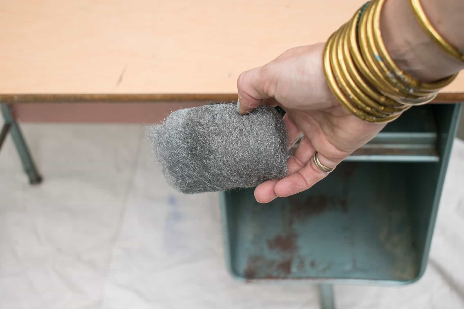 scrub the desk with steel wool