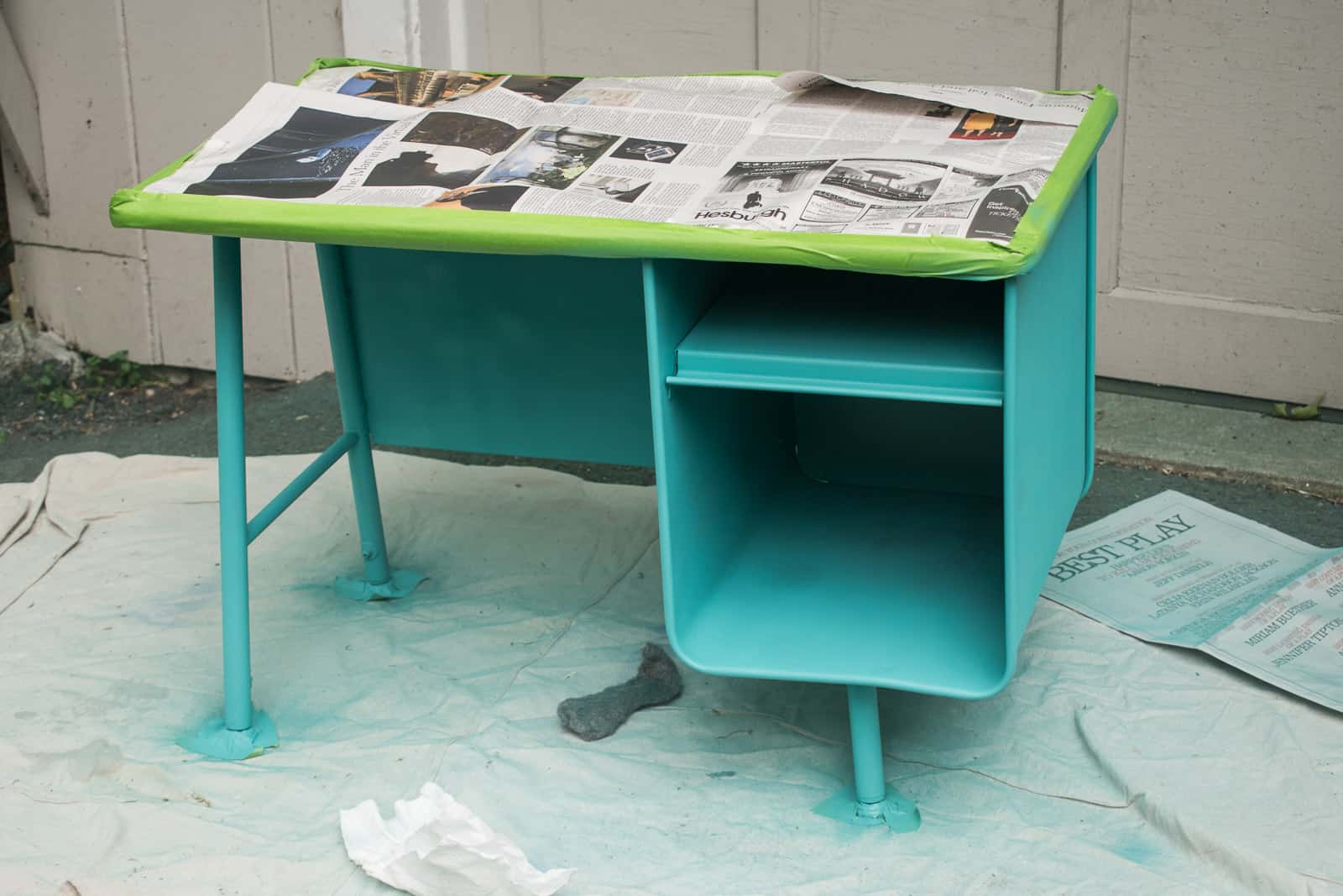 spray painting the desk