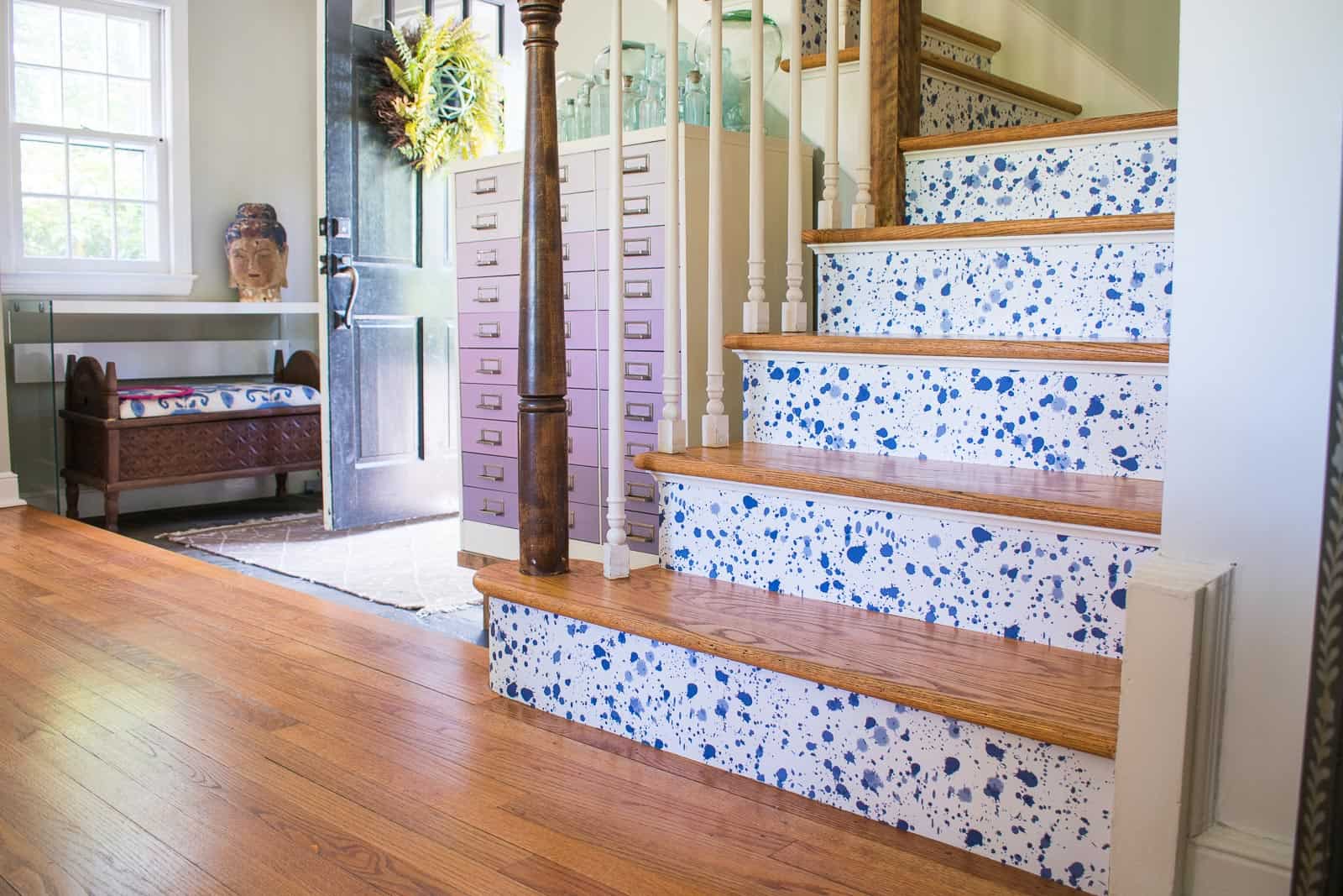 finished stair risers with wallpaper