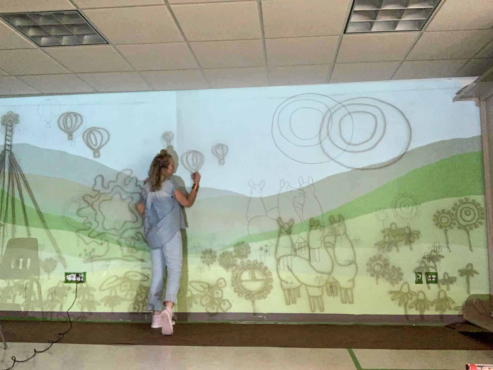 working on classroom mural