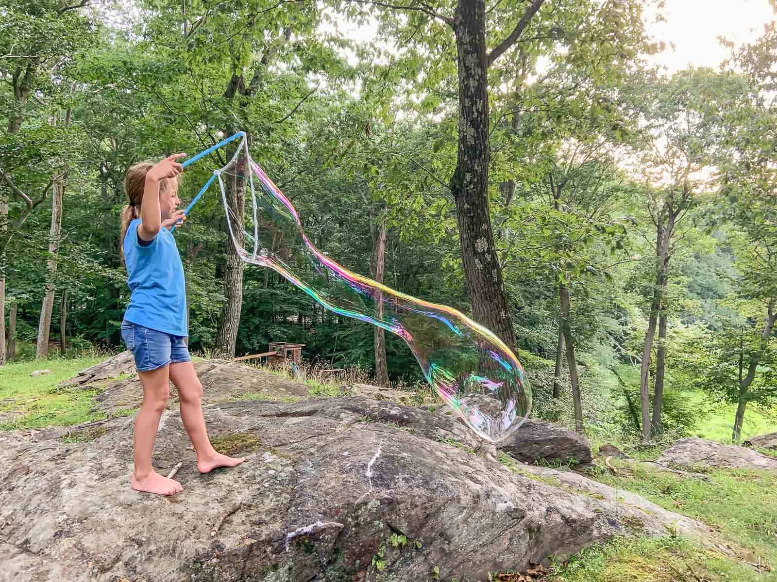 making bubbles in the backyard