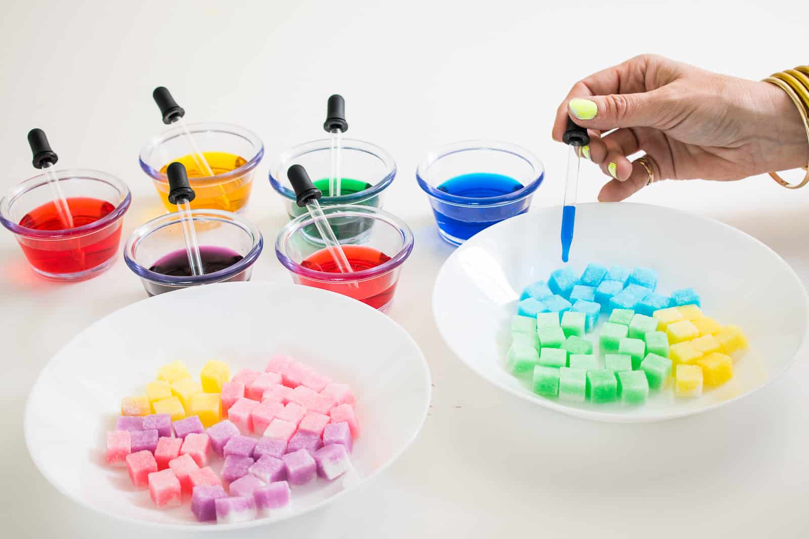 add food coloring to sugar cubes