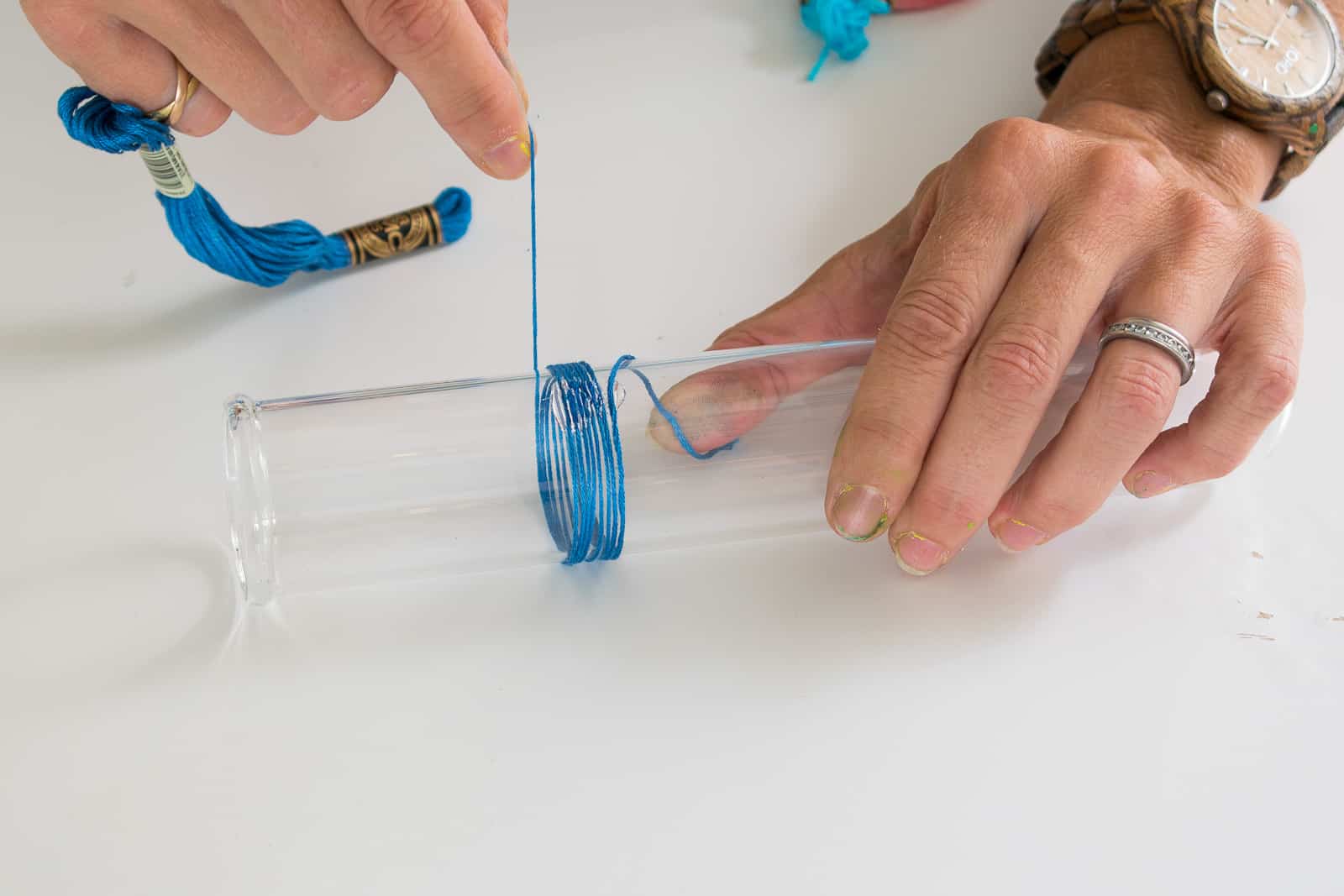 wrap the test tube with cotton thread