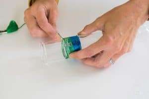 use a sewing pin to adjust thread