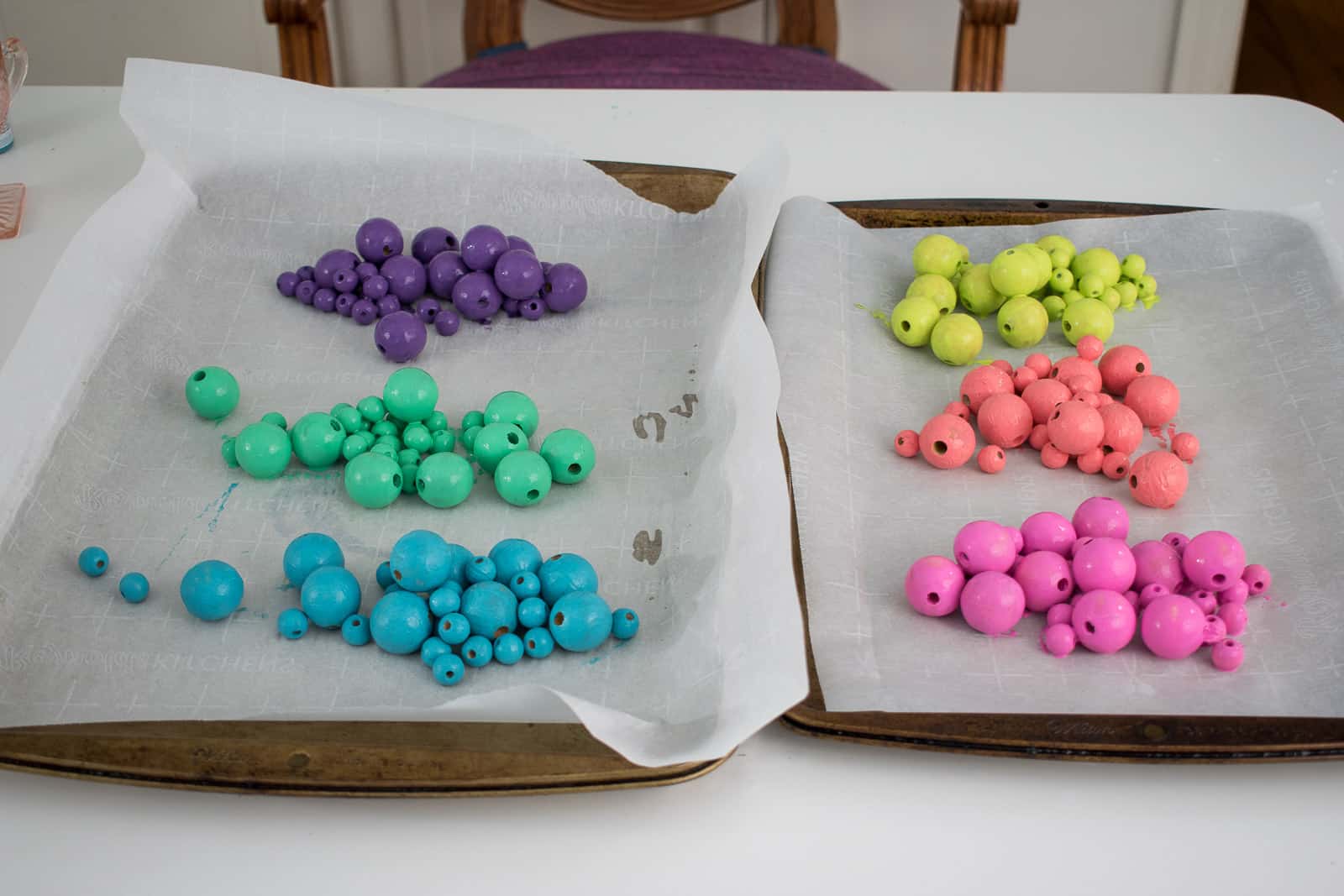 pour the beads onto parchment paper